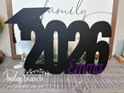 Personalized Class of 2026 graduation guest book sign with graduate name.